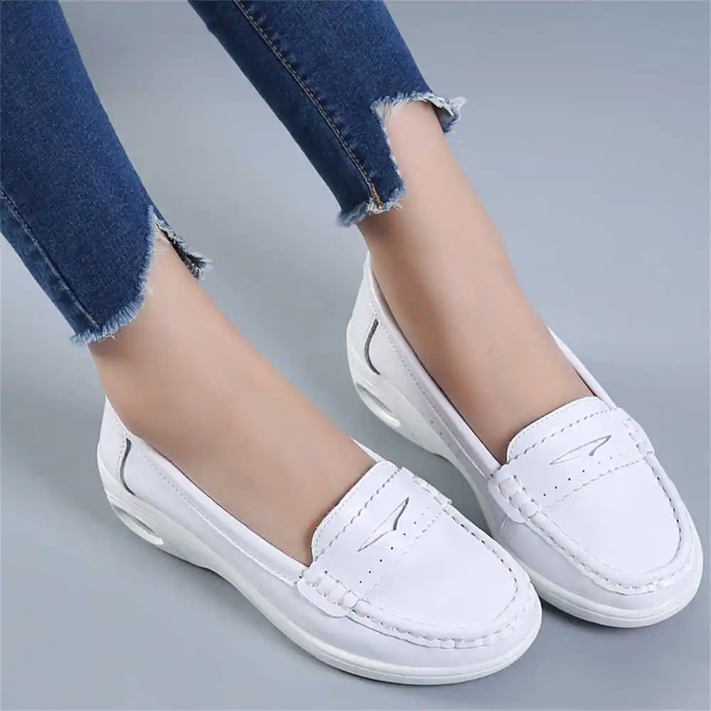 Thick Sole Slipon White Traine - огляд і ціна Women Accessories Brand Name