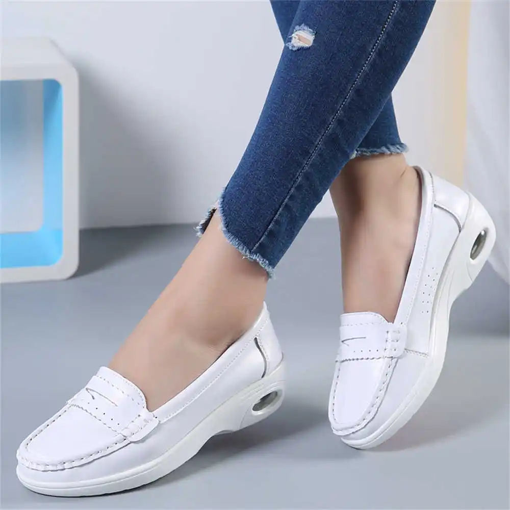 Thick Sole Slipon White Traine - огляд і ціна Women Accessories Brand Name