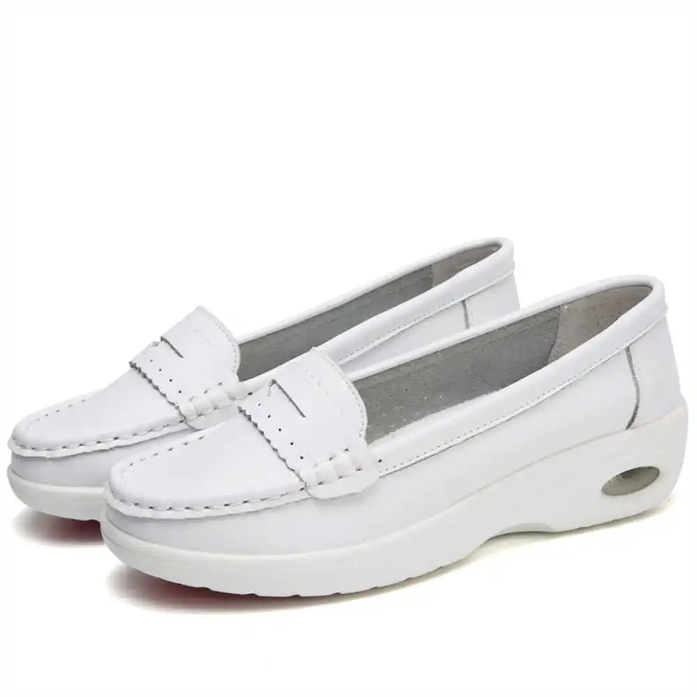 Thick Sole Slipon White Traine - огляд і ціна Women Accessories Brand Name